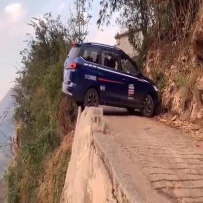 Some skill to turn in this tight narrow road along a cliff edge.