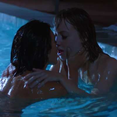 Ivy Wolfe & Janice Griffith kissing in pool