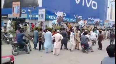 People in Pakistan destroying Samsung billboards for introducing a QR code because that is allegedly blasphemous.(source in comments)