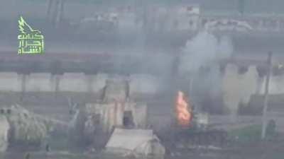 Rare footage of a tank VS tank kill. Rebel tank blows up SAA tank in regime helicopter base. January 2013. Syria.