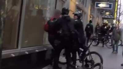 Seattle Police officers were recorded running into pedestrians with their bikes and arresting the victims for assault.