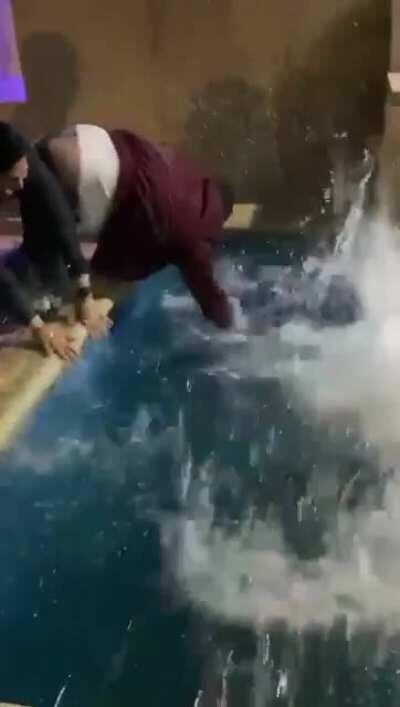 To throw someone in the pool