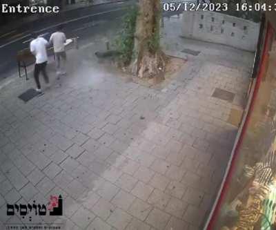 Rocket remains fall in extremely close proximity to civilians in Tel Aviv, 5.12.2023