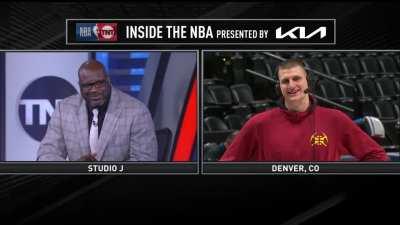 Shaq tries another foreign language and Jokic checks his headset