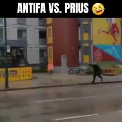 ANTIFA VS PRIUS ....wondering if they still wanna Defund The Police.