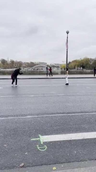 Getting a photo in front of the Eiffel Tower