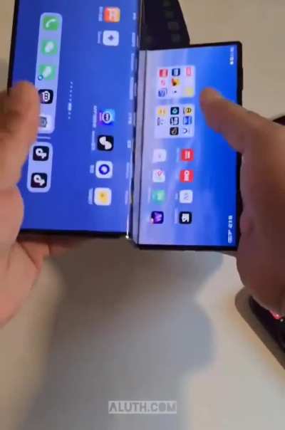 Showing the Huawei Mate XT. It is the size of 3 phones and can be folded into 2 other display sizes.