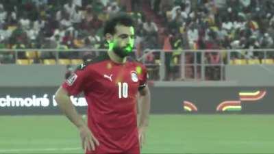 Mo Salah taking a penalty for Egypt with 3,000 laser pointers in his eyes earlier today