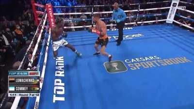 Vasyl Lomachenko points to his opponents corner to see if they want him to continue, then begs them to stop the fight for their fighters well-being