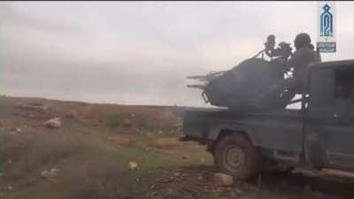 HTS technical operator with using his vehicle’s ZPU-4 near Nayrab, Idlib in February 2020