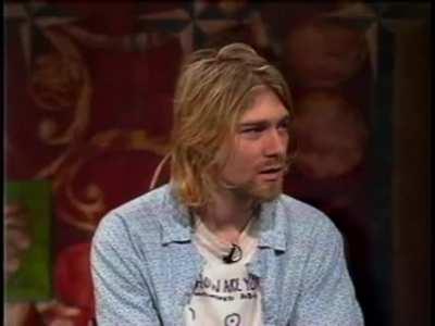 Nirvana react to hearing what other artists charge for concert tickets, 1993