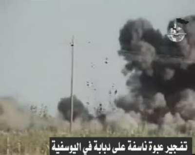 Al Qaeda In Iraq Militants Place an Improvised Explosive Device by the Side of a Road Which is detonated As an american tank passes in al-Yusefia, unkown date 2005 November 10