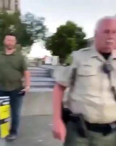 Guy holds donut in front of cops faces, gets arrested