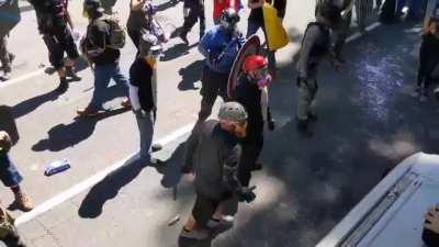 Trump Supporters in Portland have a lengthy battle with a large inanimate object.