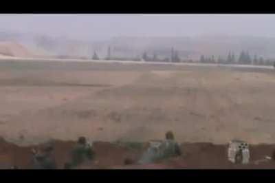 FSA fighters set up an ambush point to take shots at passing Syrian Army vehicles - Idlib - 2/13/2013