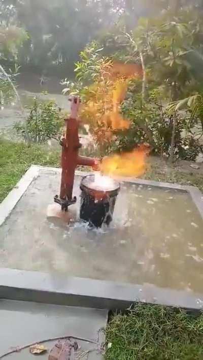 Fire coming out from a tube-well