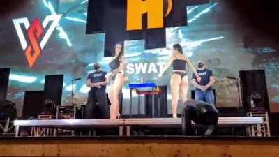 Women rear slapping contest.