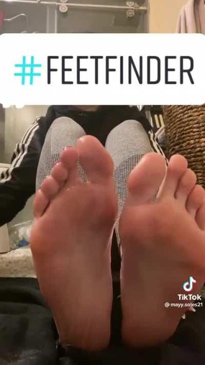 Taking her socks off!