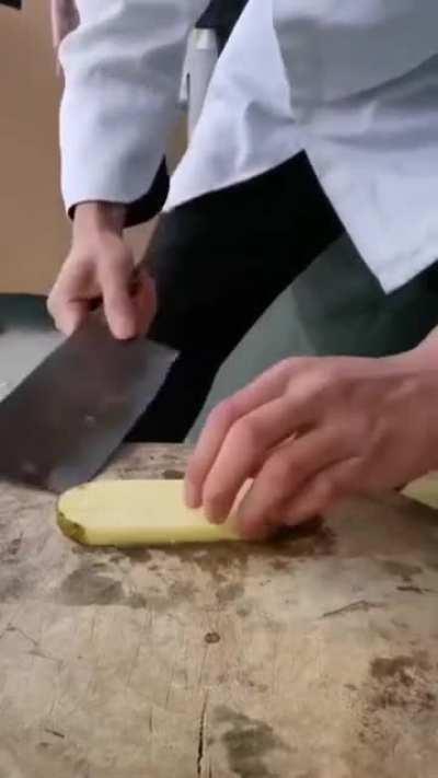 Cutting a potato (sound on)