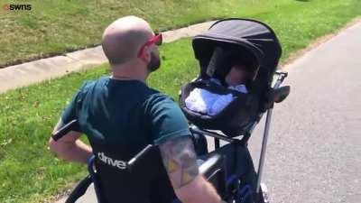 School kids design a wheelchair pram for a disabled dad so he can take his baby son for a walk