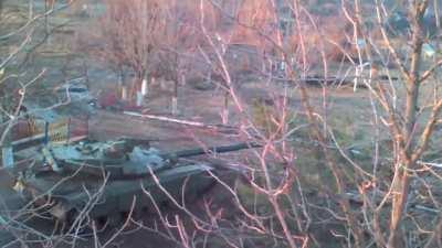 Ukrainian BTR/Tank take turns emerging from cover to engage separatist positions during fighting for Shyrokyne - March 2015