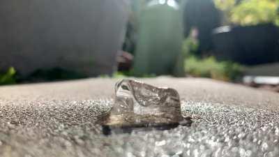 Ice cube melting, timelapse