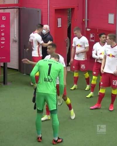 To fist bump the goalkeeper