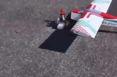 WCGW spinning the propeller of a remote control airplane with your foot?