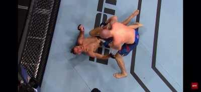 Volume on. Niko Price finishes James Vick with a brutal upkick.