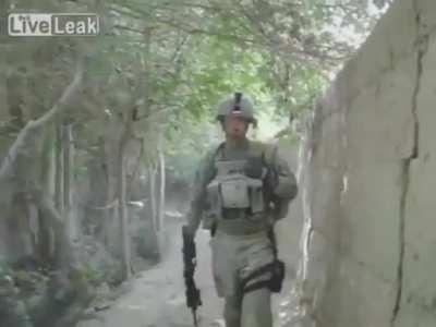 U.S. Army soldier accidentally picks up IED in Afghanistan. A soldier picks up what looks to be an old artillery shell. After realizing the whole thing was rigged with wiring, he quickly runs away.