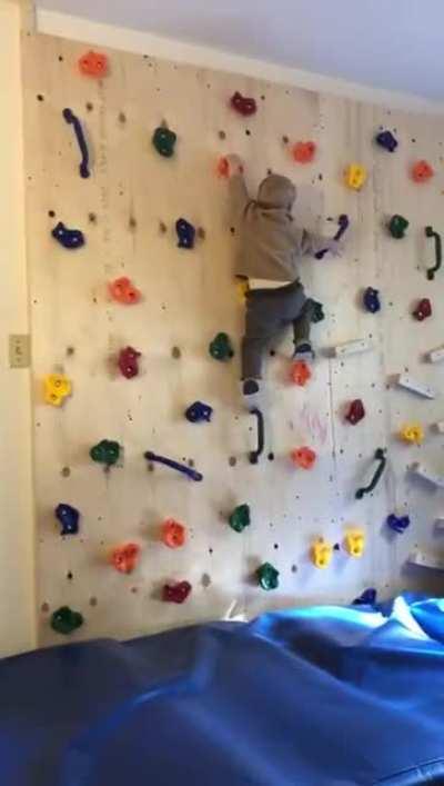 Kid kept climbing the furniture so his father built him a climbing wall. Little did the father know it would just make the child more powerful.