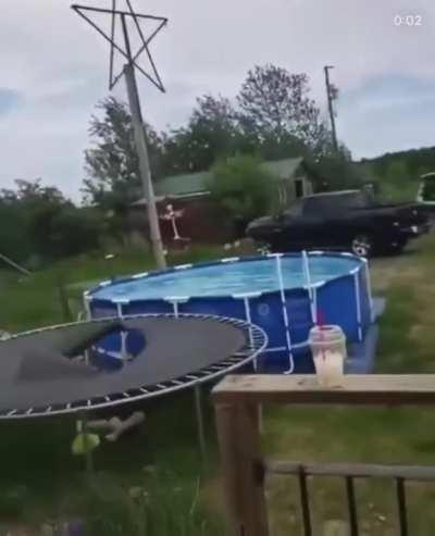 Insane rooftop jump into a pool.