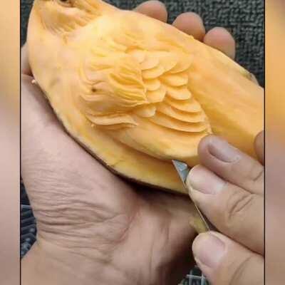 Carving sculptures from fruit and vegetable