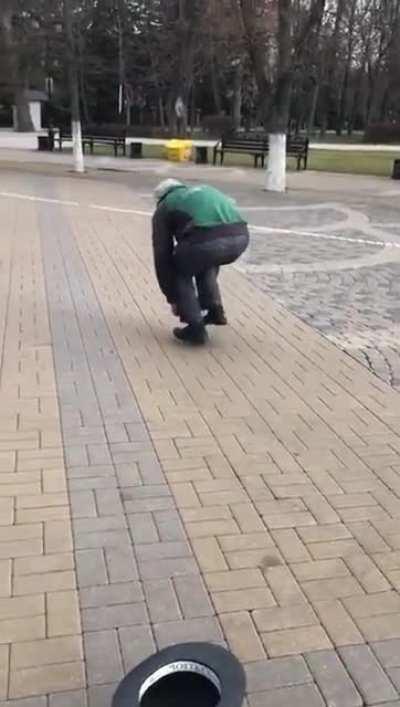 Grandpa riding the tiniest bike.