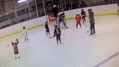 Volunteer coach for kids hockey takes a puck to the bean pouch (oc)