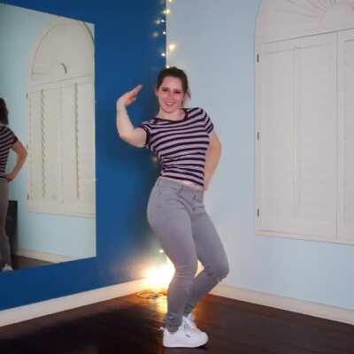 Her dancing figure shines in good ol shirt and jeans!