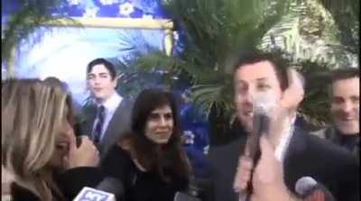 Adam Sandler and Jennifer Aniston are shocked by the size of an Australian reporter