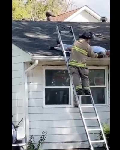 Intoxicated man crashes truck into a house causing a fire, then passes out on the roof.