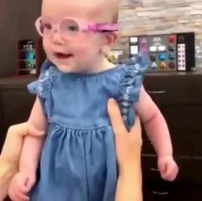 Visually impaired baby girl sees her parents for the first time.