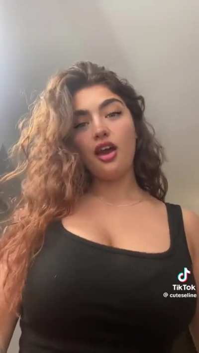 The tank top is hot as fuck 