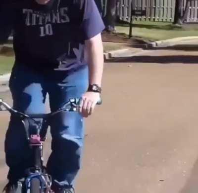 Old dude stunting on a bike