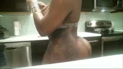 Gabby in the kitchen playing with her ass and pussy