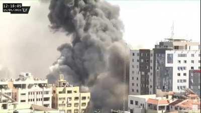 Israeli army airstrike destroys the Al-Jalaa building in Gaza, used as the offices of AP and Al-Jazeera.