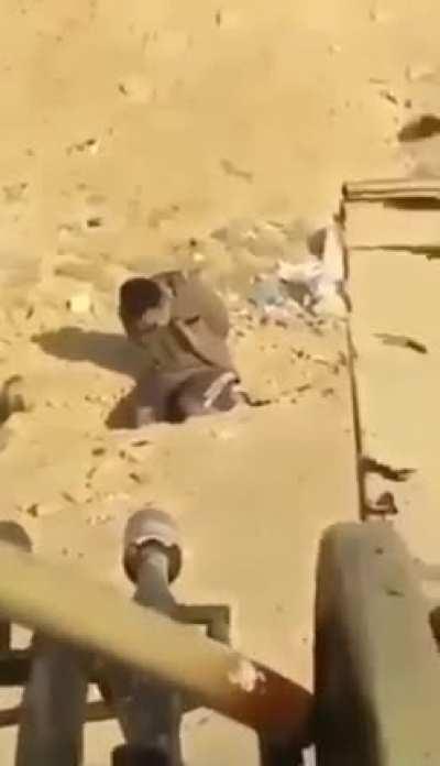 (NSFL) ISIS prisoner being destroyed by a ZU-23 anti-aircraft gun