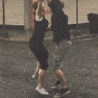 This couple dancing in the rain.