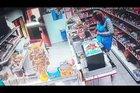 A grocery store clerk fights off a robber