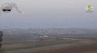 Hezbollah driver calmly waits for the just the right second to move his pickup truck to avoid guided missile, Syria.