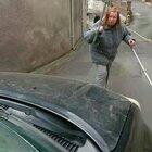 Woman refuses to move for car, driver beeps horn...... And then this