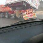 Egypt. This lorry driver lost his rear left wheel for some reason and thought it was a good idea to balance the trailer by tilting it to the right.